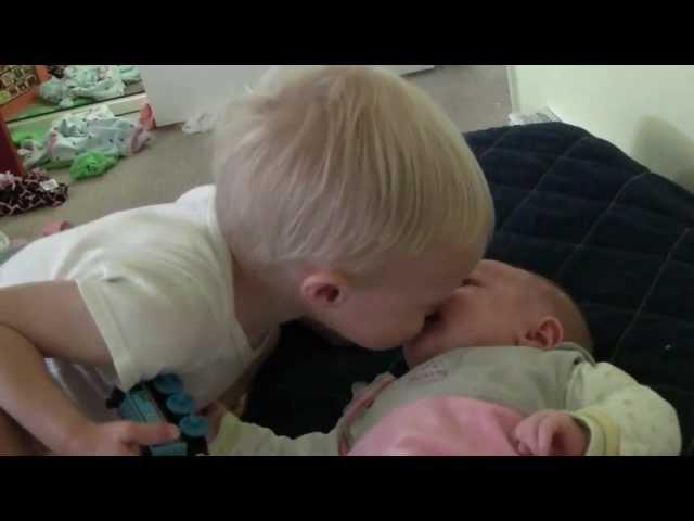 Baby Micah Giving Sister Ruby a Kiss