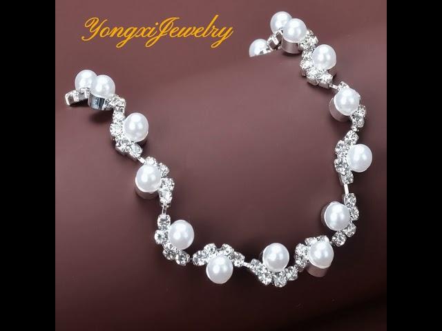 Discover elegance redefined with Yongxi Jewelry’s charming Rhinestones Pearl Bracelet!