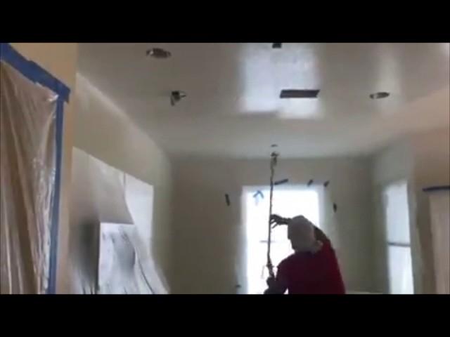 Spray painting interior ceilings with Eminence ceiling paint