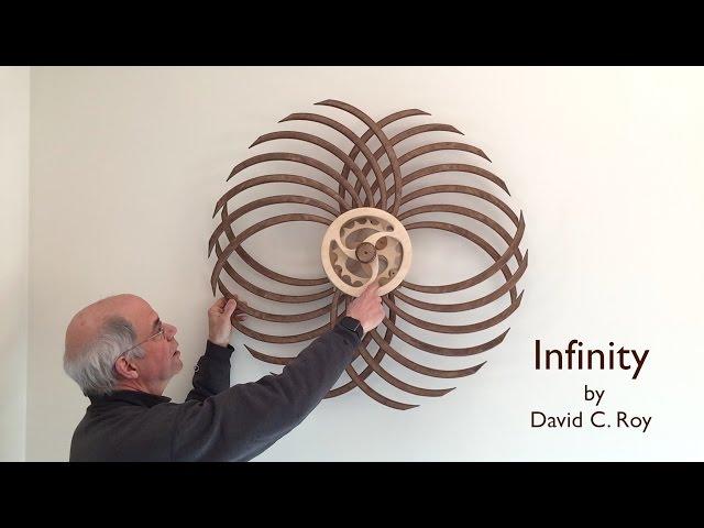 Winding the Infinity Kinetic Sculpture by David C. Roy