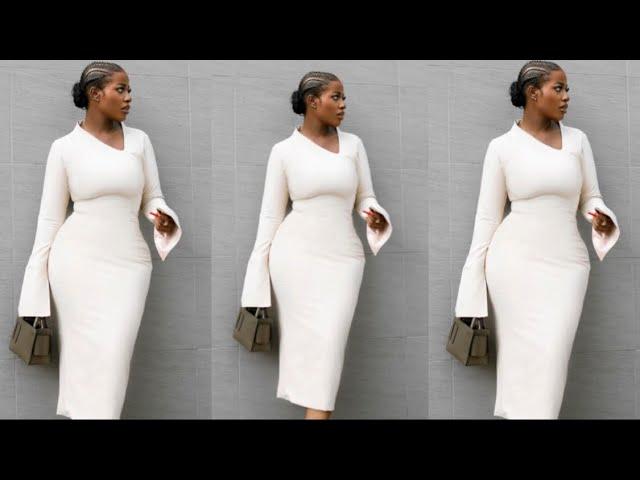 How to sew this stylish corporate dress with a built up asymmetric neckline and a slitted sleeve