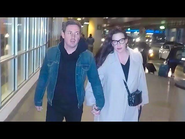 Sweet Couple Liv Tyler And Dave Gardner Holding Hands At LAX