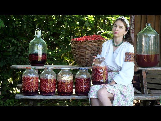 A lot of work in village! Ukrainian woman is  making traditional cherry drink "vyshnyak" 