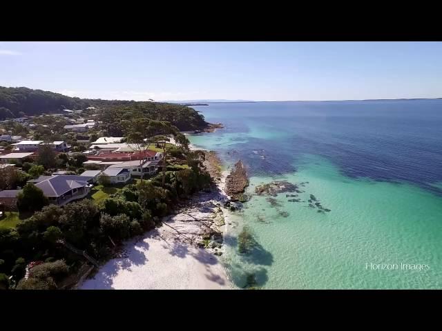 Aerial film of Hyams Beach, Jervis Bay, NSW - August 2016