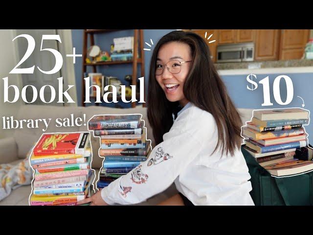 HUGE BOOK HAUL + thrifting books at a library sale!! ️