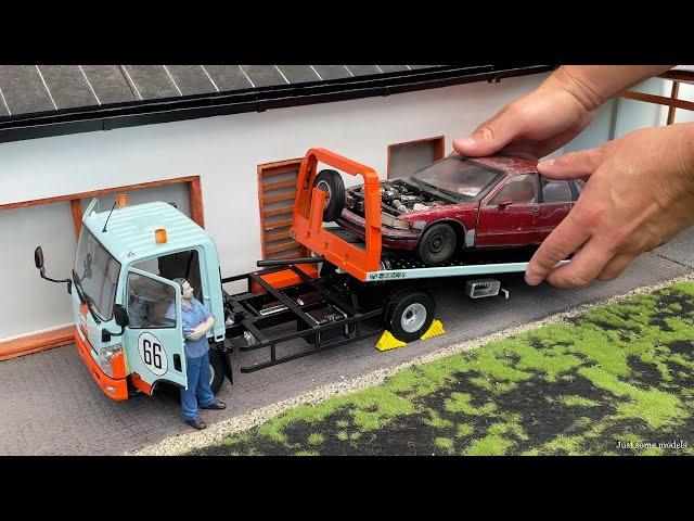 1:18 Naveco Yuejin flatbed tow truck with accessories - DBGT [Unboxing]