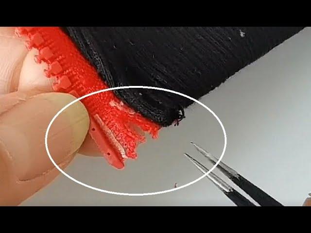 Repairing a Zipper with Super Glue and a Piece of Fabric