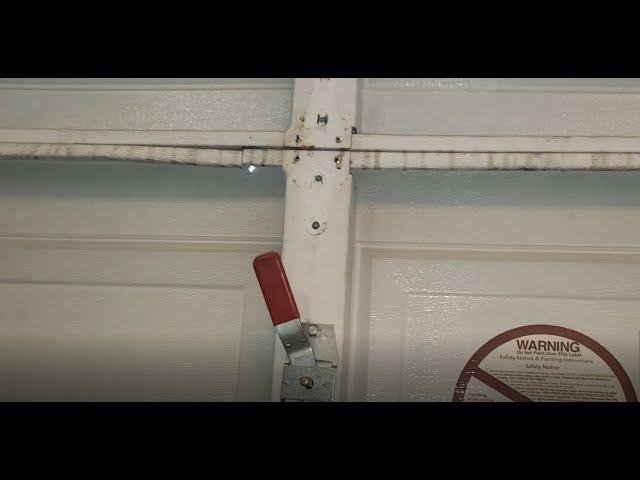 How to repair sagging or cracked garage door panels.