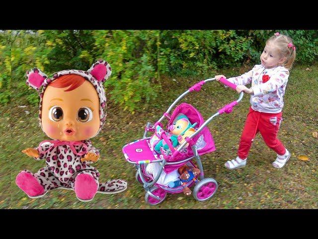 Babies dolls and funny kid doing shopping