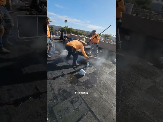 Old-school hot mopping  #shorts #roof #roofer #roofing #roofershelper #commercialroofing #flatroof