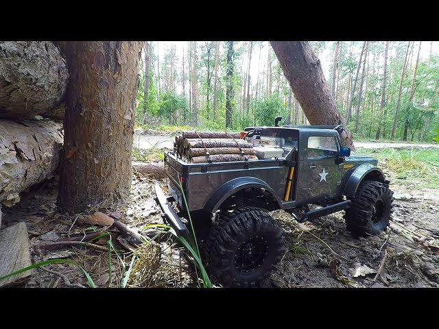 Jeep Nukizer 715 carrying wood - Custom RC Vaterra Ascender