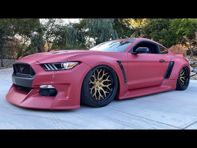 The world’s craziest widebody Mustang gets the meanest REwrap color.