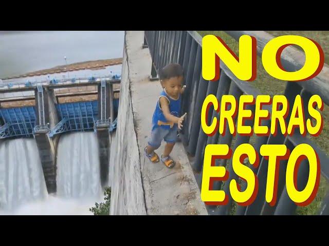 niño en la baranda de la cascada impresionante no lo creeras