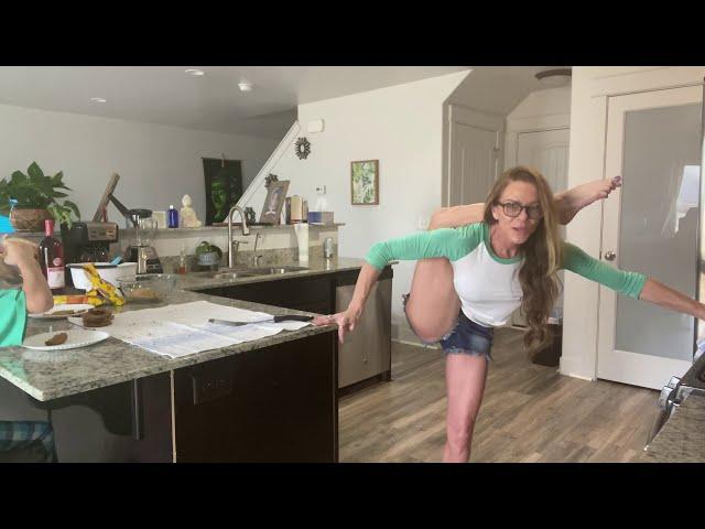 Yoga and baking with leg behind head