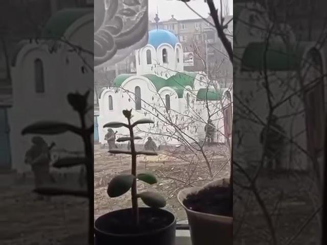 Russian soliders praying in occupied Ukraine