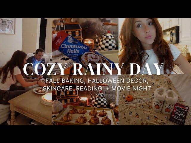 cozy rainy night vlog: fall baking, halloween decor, skincare routine, read with me, + movie night