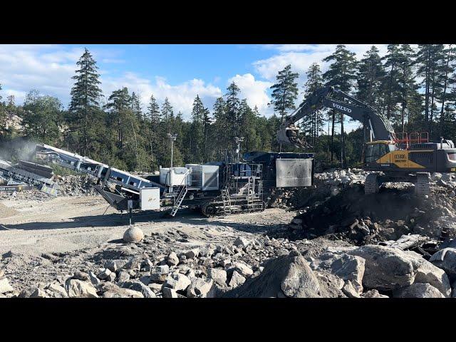 volvo 530 excavator feed Jonsson 1208 jaw crusher. quarry action! 4K