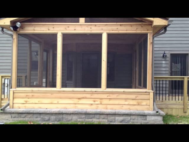 Archadeck's Custom Designed Screen porch with decks and paver patio.