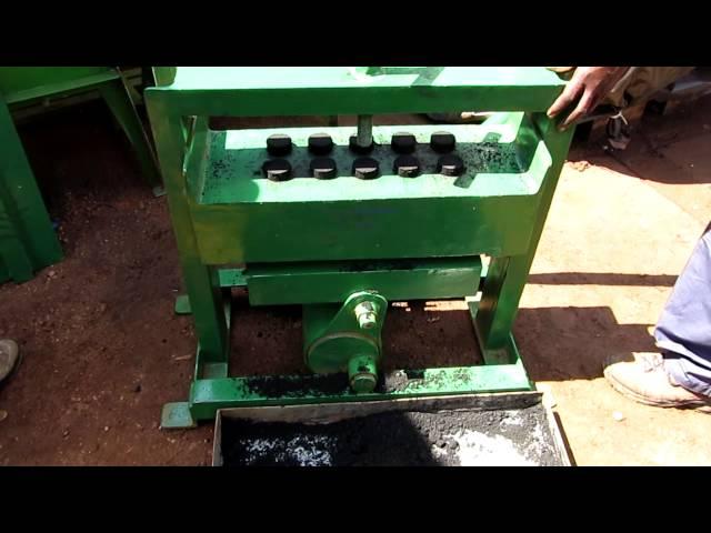 Manual charcoal briquette maker - 10 at a time with a lever