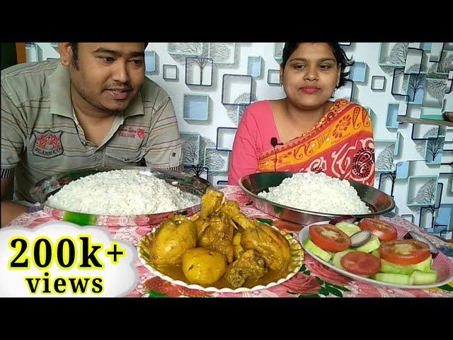 Eating show chicken curry, rice and salad,