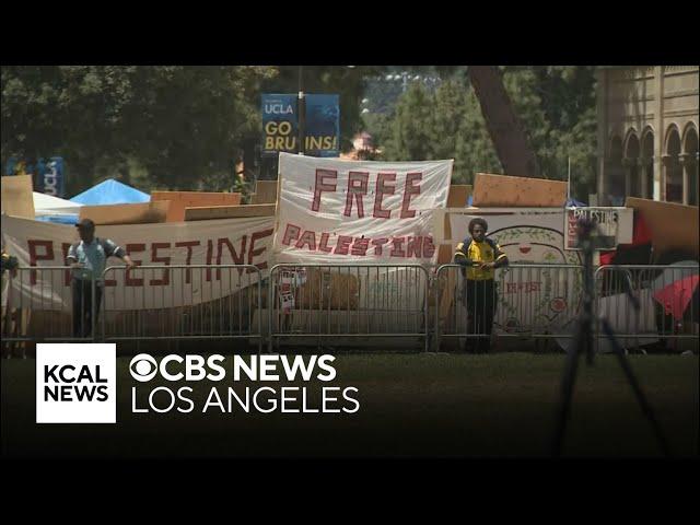 Pro-Palestinian protesters block UCLA students from entering campus