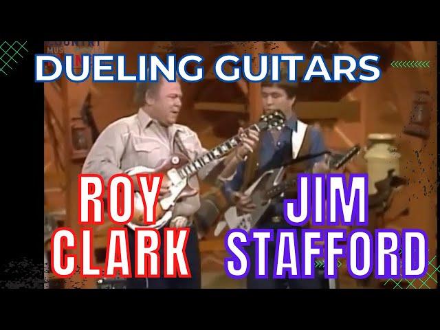 Roy Clark And Jim Stafford  - Dueling Guitars - AMAZING GUITAR LICKS!