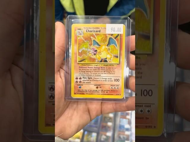 Vendor Selling Base Set Charizard Pokemon Card