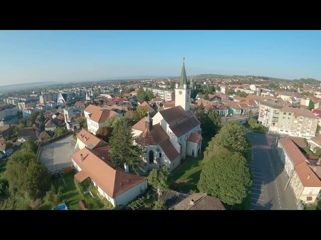 The Evangelical Church and the Violin Monument in Reghin, Romania