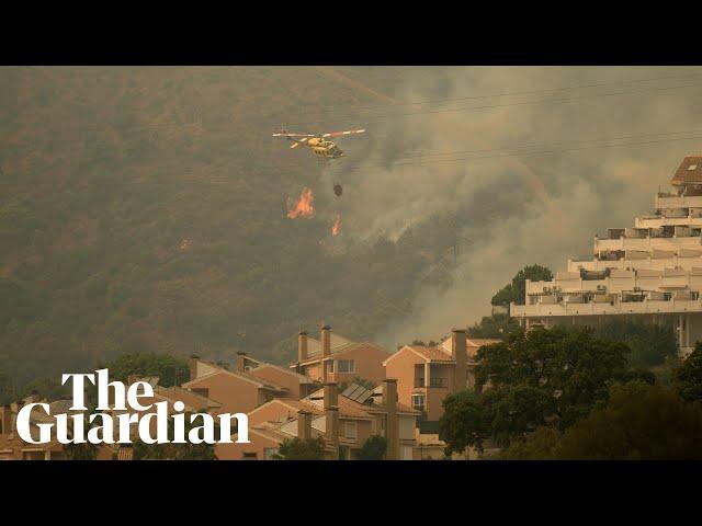 Wildfire in south of Spain forces thousands to flee their homes