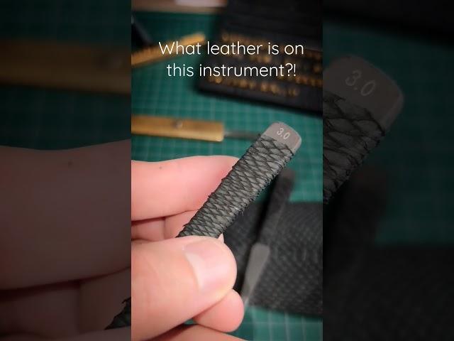 What leather is on this instrument?! Punch Crimson Hides in shop Tools and Toys for Craftsmen.