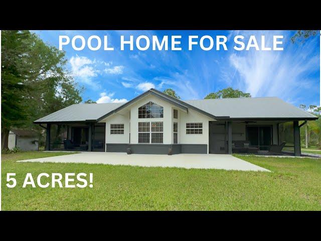 Inside a 5 ACRES  Home for sale in North Fort Myers Florida with a POOL 'SOLD'