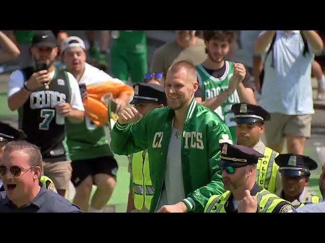 Boston Celtics Kristaps Porzingis arrives at duck boat parade