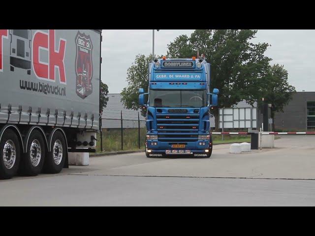 Trucks arrive at Truckshow [open pipe sounds]