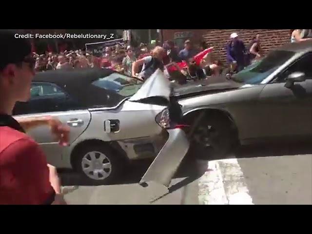 Video shows car ramming into protesters in Charlottesville