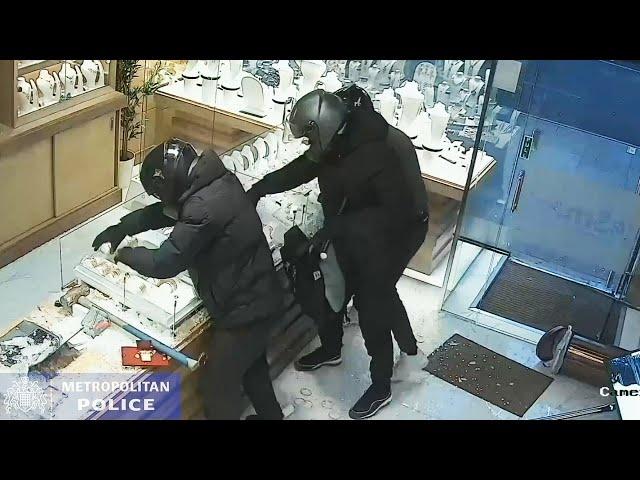 Dramatic smash-and-grab robbery at west London jewellers is caught on CCTV