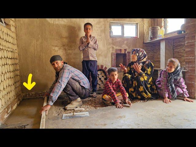 Cementing the shelter floor is a big step for the mother of nomads in the mountains! 