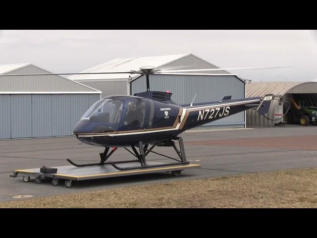 Enstrom 480b takes off from cart