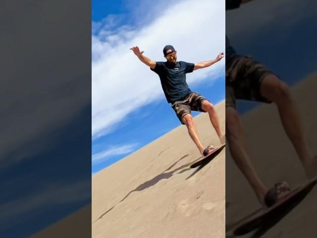 Sand Boarding at Great Sand Dunes National Park #sandboarding #greatsanddunes #father #family