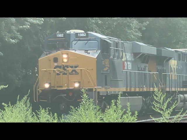 CSX 1982 ES44AH Seaboard System heritage unit leads CSX I032 through Manville NJ! 7/23/2023