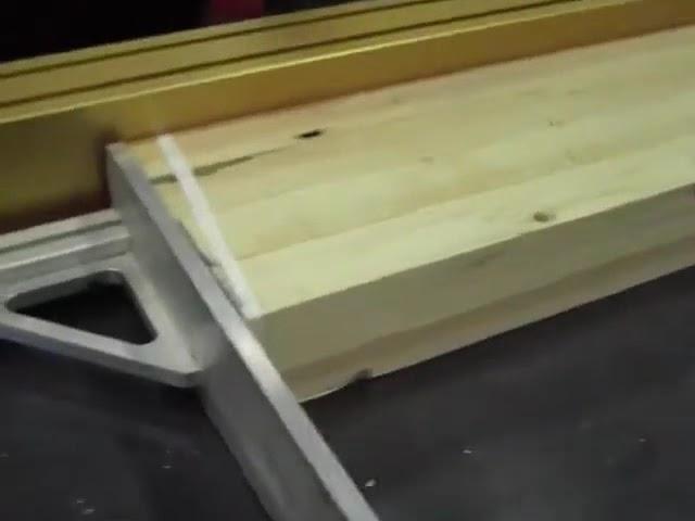 Automatic Pusher Upcut Saw cutting wood bundles   RazorGage