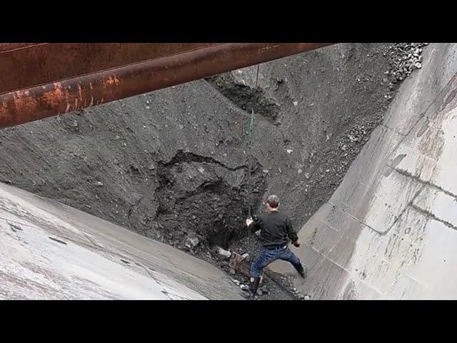 Barge unloading ore and river sand - relaxing video