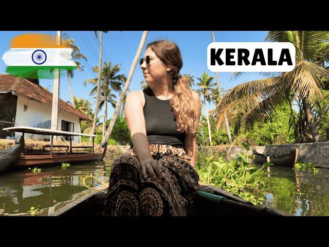 traveling the backwaters of alleppey in a canoe (god's own country)