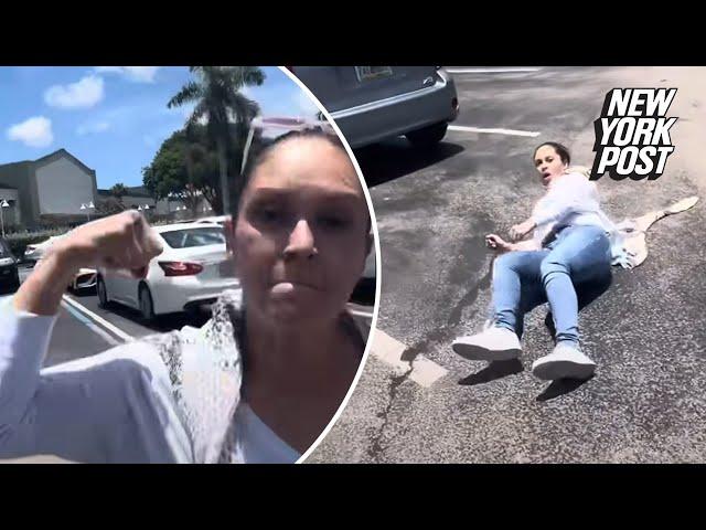 Enraged Florida woman goes ballistic in parking lot, swings at YouTuber and is knocked to the ground