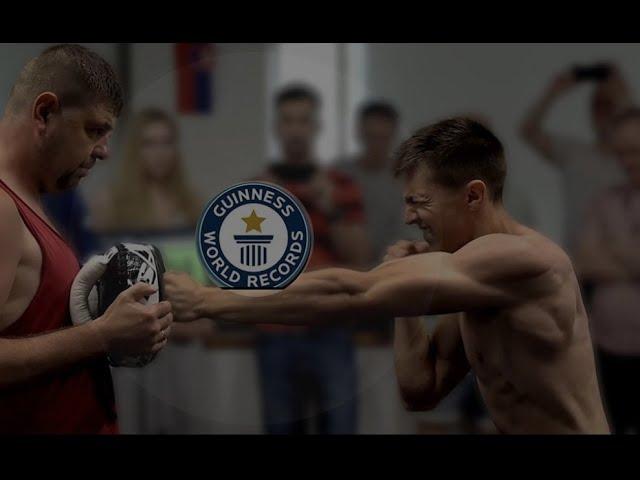 Guinness world record holder Pavel Trusov   On the 16” Bull Doza Fight Wear Water Punch Bag