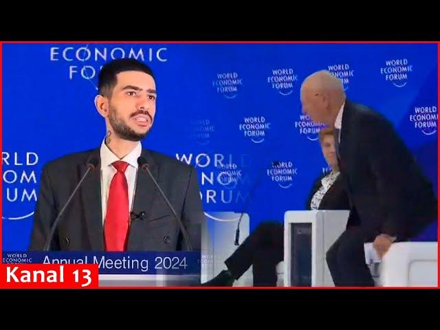 Damon Imani hurling abuses at Klaus Schwab during Davos Meeting - f*** you