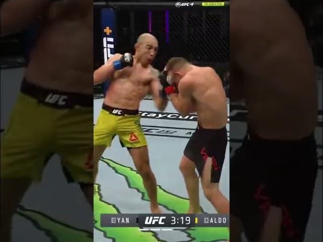 Petr Yan finally checks a leg kick and hurts Jose Aldo's shin.