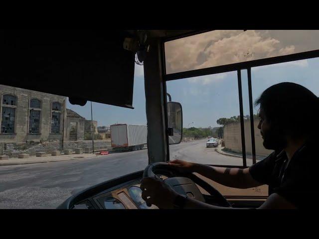 Bus driving with swallow Garrage Malta