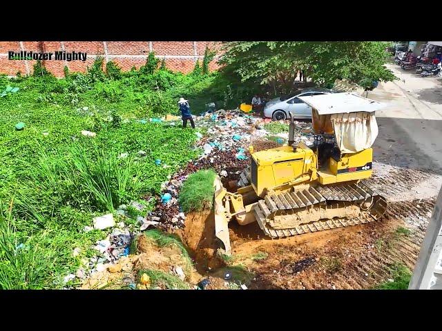 Heavy machinery, Processing Filling Up The Land, Bulldozer KOMATSU D31P, Dump Truck unloading