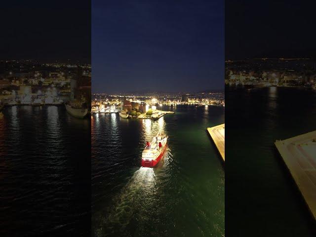 Ship arrival at Port of Piraeus night view