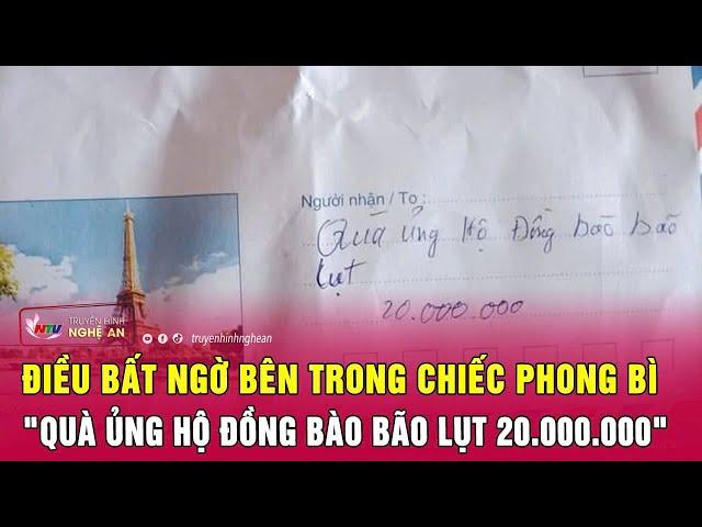 Điều bất ngờ bên trong chiếc phong bì dán kín, ghi dòng chữ "quà ủng hộ đồng bào bão lụt 20.000.000"